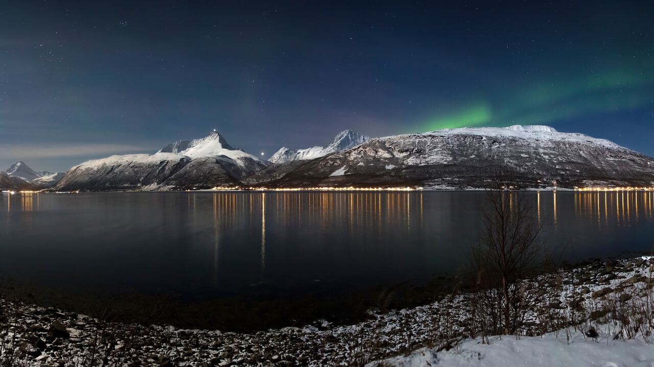 Aurora borealis above Storfjorden and the Lyngen Alps in moonlight, 2012 March